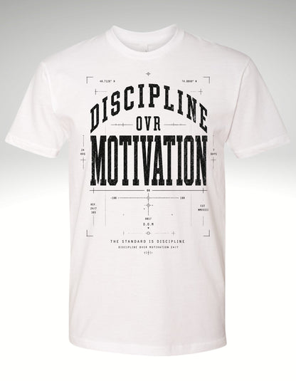 A white short-sleeve crewneck t-shirt with a black graphic print on the front reading 'DISCIPLINE OVR MOTIVATION' in an architectural blueprint style.