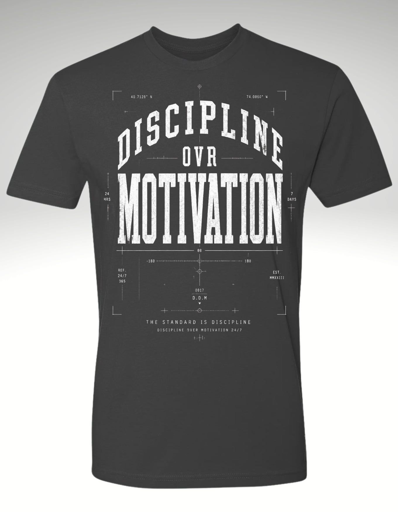 A dark charcoal gray short-sleeve t-shirt with a white graphic print on the front reading 'DISCIPLINE OVER MOTIVATION' in a blueprint-style font.