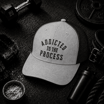 Addicted to the Process Blackout — Trucker Hat - Discipline Over Motivation 24/7