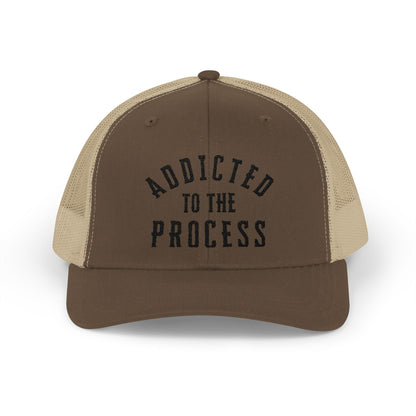 Addicted to the Process Blackout — Trucker Hat - Discipline Over Motivation 24/7