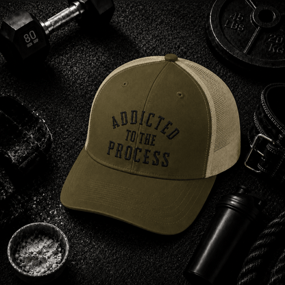 Addicted to the Process Blackout — Trucker Hat - Discipline Over Motivation 24/7