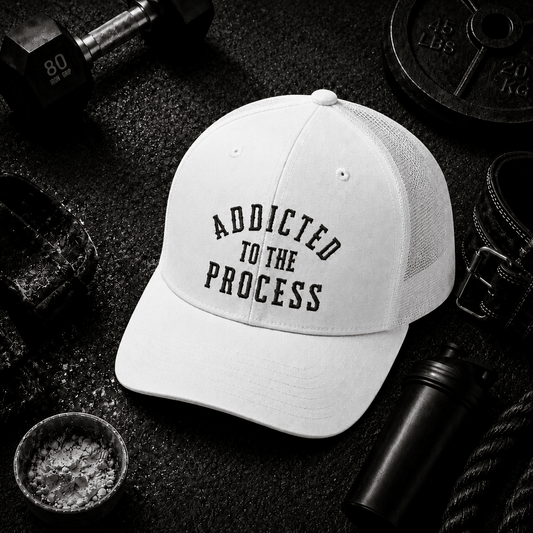 Addicted to the Process Blackout — Trucker Hat - Discipline Over Motivation 24/7