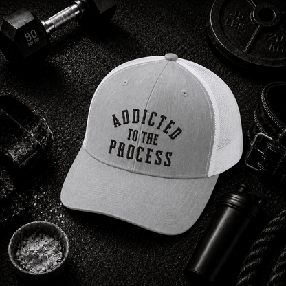 Addicted to the Process Blackout — Trucker Hat - Discipline Over Motivation 24/7