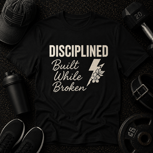 Disciplined. Built While Broken Tee - Discipline Over Motivation 24/7