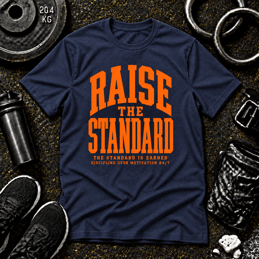 Raise the Standard™ Tee - Discipline Over Motivation 24/7