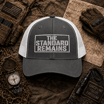 THE STANDARD REMAINS™ — EMBROIDERED TRUCKER HAT - Discipline Over Motivation 24/7