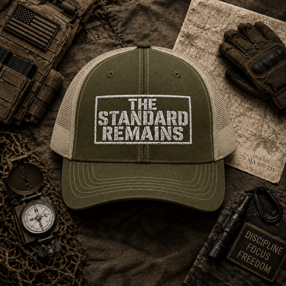 THE STANDARD REMAINS™ — EMBROIDERED TRUCKER HAT - Discipline Over Motivation 24/7