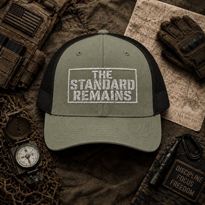 THE STANDARD REMAINS™ — EMBROIDERED TRUCKER HAT - Discipline Over Motivation 24/7