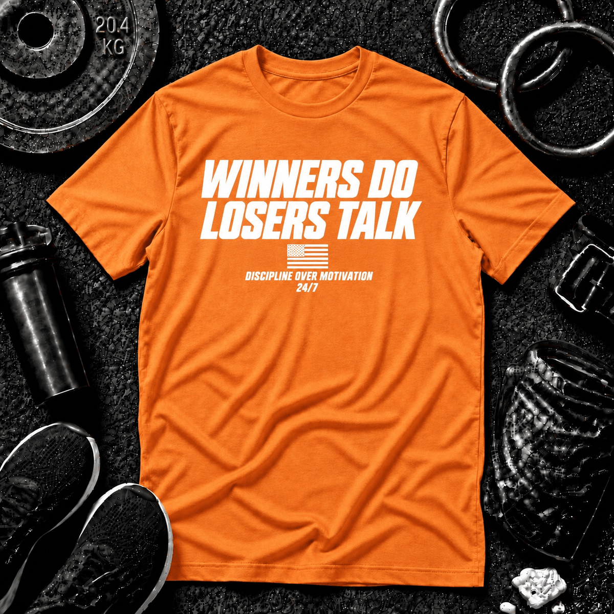 WINNERS DO. LOSERS TALK.™ Tee - Discipline Over Motivation 24/7