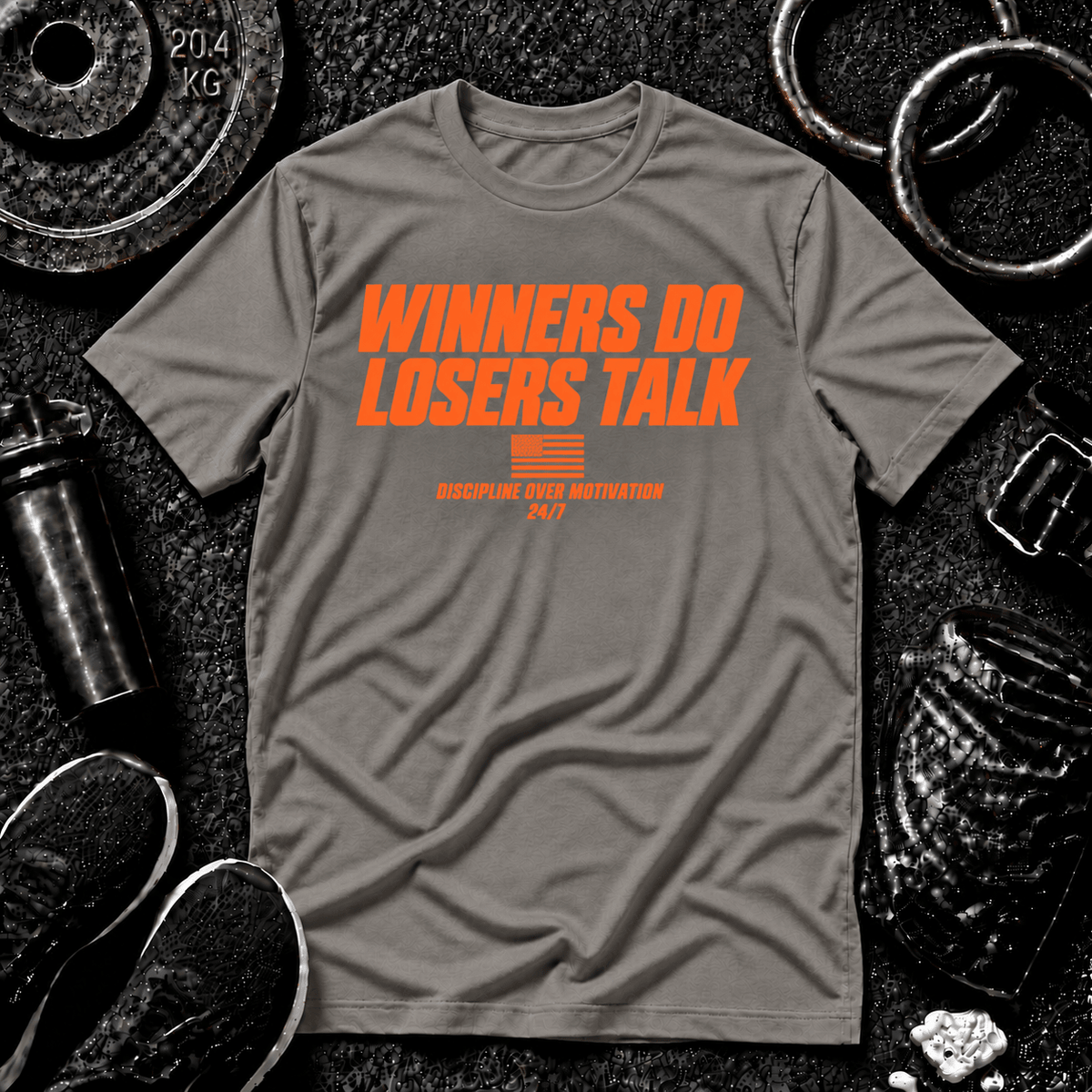 WINNERS DO. LOSERS TALK.™ Tee - Discipline Over Motivation 24/7